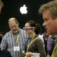 A picture of people trying AR glasses at an Apple event